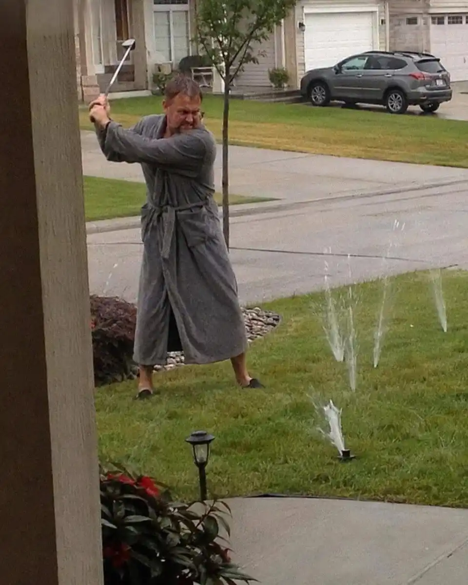 A Neighbor Dispute Over Lawn Sprinklers and a New Car